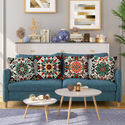 linen-look polyester pillow covers with colorful Mexican floral medallion prints, styled on a teal sofa