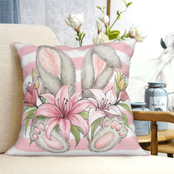 Pink bunny and lily short-pile plush Easter pillow cover styled on a chair