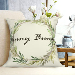 Cream bunny wreath short-pile plush Easter pillow cover styled on a chair