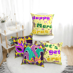short-pile plush polyester pillow covers with colorful Mardi Gras masks and party lettering, arranged beside a white chair