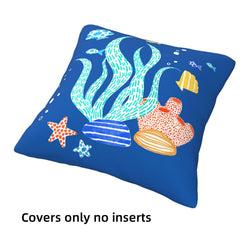 Short-pile plush polyester pillow cover with blue coral, shells and starfish print, shown on white