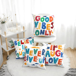 short-pile plush polyester pillow covers with colorful inspirational classroom quotes, arranged beside a white chair