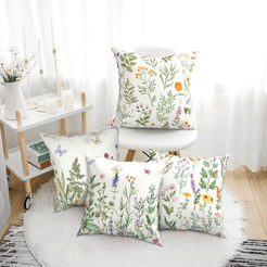 short-pile plush polyester pillow covers with delicate wildflowers and butterflies, arranged beside a white chair