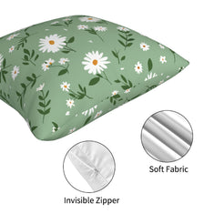 Hidden zipper and fabric close-up on short-pile plush polyester pillow cover with white daisies and leafy sprigs on green