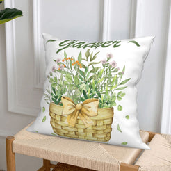 Short-pile plush pillow covers with a flower basket with Gather lettering, styled on a woven chair