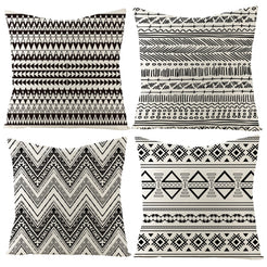 Set of four water-resistant linen-look polyester pillow covers with tribal stripes and chevrons