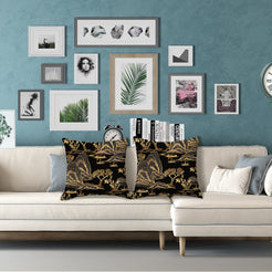 velvet polyester pillow covers with gold mountain and pagoda landscape on black, styled on a white sectional