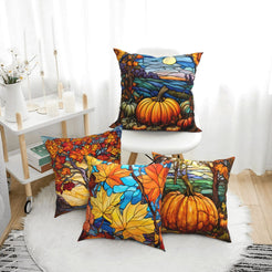 short-pile plush polyester pillow covers with pumpkins, autumn trees and colorful maple leaves, arranged beside a white chair