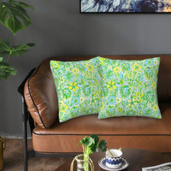 Velvet pillow covers with lime botanical animals, styled on a sofa
