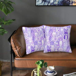 Velvet pillow covers with lavender cats, styled on a sofa