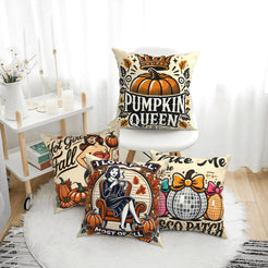 Four cream fall pillow covers with Pumpkin Queen and retro fall designs, styled on a bench