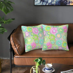 Velvet pillow covers with mint smiling sunflowers, styled on a sofa