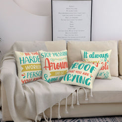 Four short-pile plush pillow covers with colorful motivational typography on a cream background, styled on a sofa