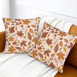 Halloween velvet pillow covers with cream autumn leaves and mushrooms, styled on a sofa
