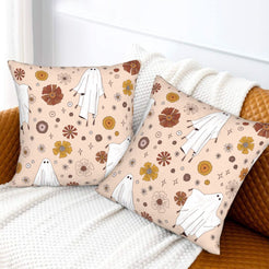 Halloween velvet pillow covers with blush ghosts and flowers, styled on a sofa