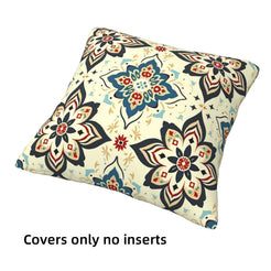 short-pile plush polyester pillow cover with blue and rust floral medallions on cream, shown at an angle on white