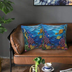 Velvet coastal pillow covers with sea turtles and coral reef, styled in a living room