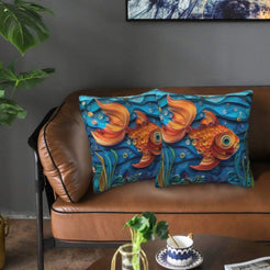 Velvet coastal pillow covers with orange goldfish in blue waves, styled in a living room