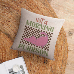 Linen-look pillow cover with Not a Morning Purrson cat illustration, shown in a flat lay