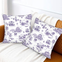Mardi Gras velvet pillow covers with New Orleans landmarks in purple toile on white, styled on a bed