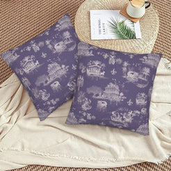 Mardi Gras velvet pillow covers with New Orleans toile in pale purple on deep purple, styled on a floor cushion