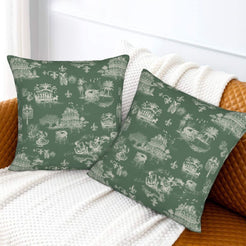 Mardi Gras velvet pillow covers with New Orleans toile in pale green on dark green, styled on a bed