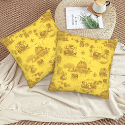 Mardi Gras velvet pillow covers with New Orleans toile in brown on mustard yellow, styled on a bed