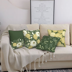 Dark green floral pillow covers styled on a beige sofa