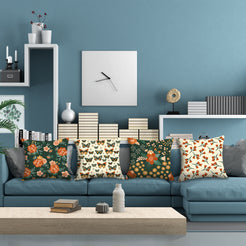 Green floral and butterfly pillow covers styled in a modern living room