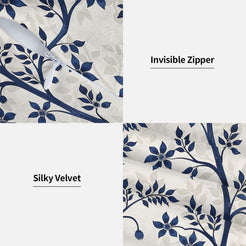 Hidden zipper and soft fabric detail on a block-print-inspired velvet pillow cover with navy flowering branches