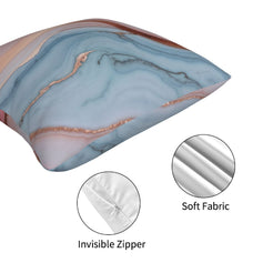 Zipper and fabric detail on a short-pile plush pillow cover with blush, blue and rose gold marble designs