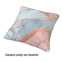 Single short-pile plush pillow cover with peach, blush and blue marble designs, shown without an insert