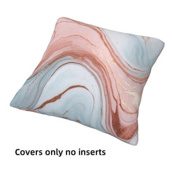 Single short-pile plush pillow cover with blush, blue and gold marble designs, shown without an insert