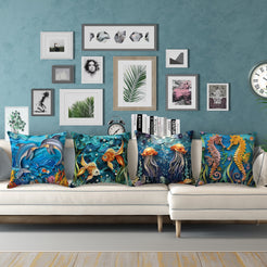 Coastal short-pile plush pillow covers with dolphins, koi fish, jellyfish and seahorses, styled on a white sofa