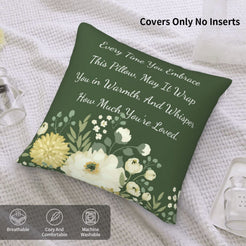 Velvet pillow cover with dark green floral pattern and heartfelt love quote on a bed with cover-only note