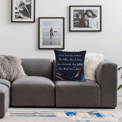 Velvet pillow cover with navy blue marble pattern and heartfelt love quote, styled on a sofa