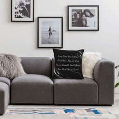 Velvet pillow cover with black marble pattern and heartfelt love quote, styled on a sofa