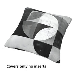Short-pile plush pillow cover with black and gray Bauhaus-style curves, shown without an insert