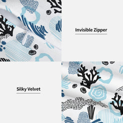 Hidden zipper and velvet detail on a pillow cover with abstract blue coral and shells