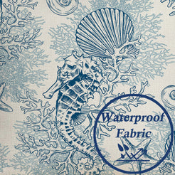 Close-up of printed texture on water-resistant linen-look polyester pillow cover with blue shells, coral and seahorses
