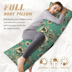 Green toile full body pillow cover shown supporting a resting sleeper