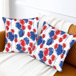 4th of July velvet pillow covers with red and blue balloons, styled on a sofa