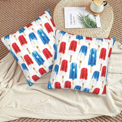 4th of July velvet pillow covers with red and blue popsicles, styled on a woven chair