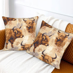 Western velvet pillow covers with cream Highland cow portraits, styled on a sofa