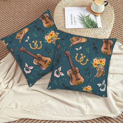 Western velvet pillow covers with teal country music and Western symbols, styled on a woven chair