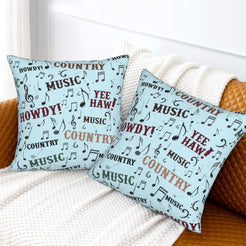 Western velvet pillow covers with light blue country music typography, styled on a sofa