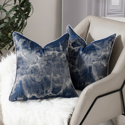 Navy blue abstract jacquard pillow covers styled on a sofa