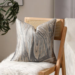 Silver marble-pattern jacquard pillow covers styled on a chair