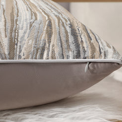Side view of a silver marble jacquard pillow cover with hidden zipper