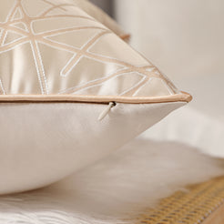Close-up of beige geometric line jacquard fabric with hidden zipper